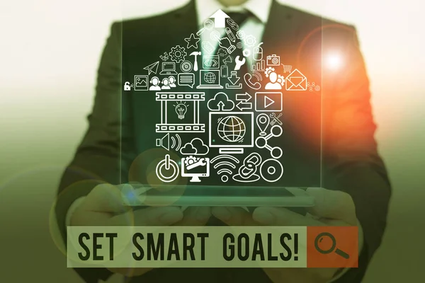 Conceptual hand writing showing Set Smart Goals. Business photo showcasing list to clarify your ideas focus efforts use time wisely.