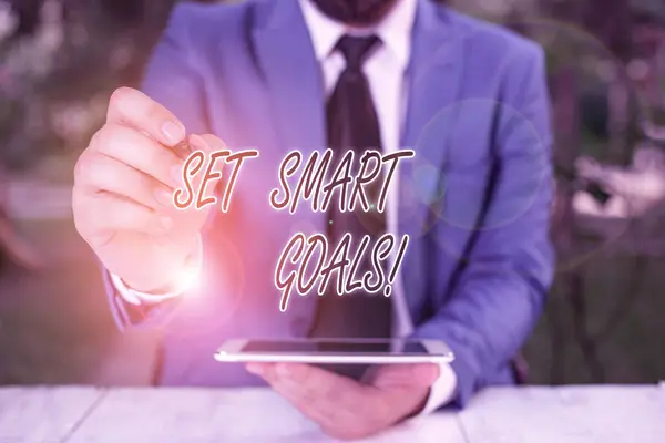 Word writing text Set Smart Goals. Business concept for list to clarify your ideas focus efforts use time wisely Businessman pointing with pen in empty copy space. — Stock Photo, Image