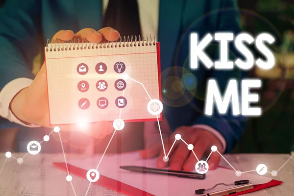 Word writing text Kiss Me. Business concept for informally request to touch my lips with your lips or press against.