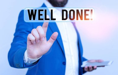 Kavramsal el yazısı aferin diyor. İş fotoğrafı metni bir şey için gösteri ya da grup övgü kullanılan iyi bir yol iş adamı önünde parmakla göstererek.