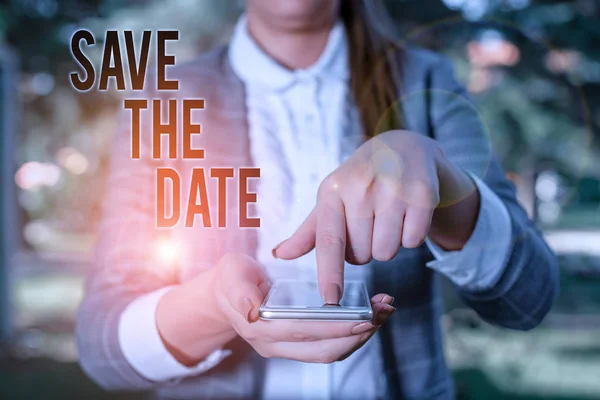 Word writing text Save The Date. Business concept for Systematized events Scheduled activity Recorded Filed Woman in grey suites holds mobile phone. — Stock Photo, Image