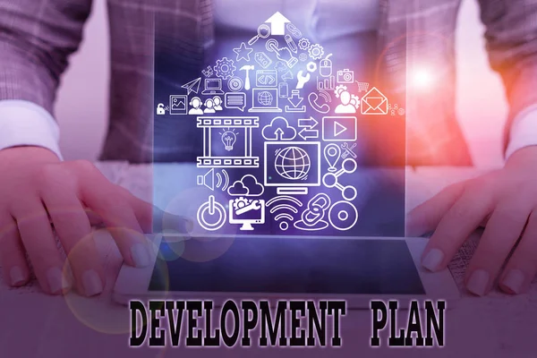 Conceptual hand writing showing Development Plan. Business photo text the planning of the development of an area of land.