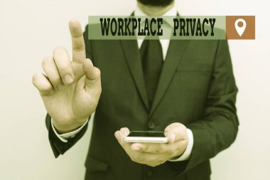 Writing note showing Workplace Privacy. Business photo showcasing protection of individual privacy rights in the workplace Male human wear formal work suit hold smartphone using hand. clipart