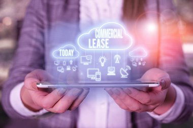 Handwriting text writing Commercial Lease. Concept meaning contract between a landlord and a business property tenants.