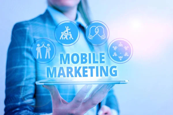 Conceptual hand writing showing Mobile Marketing. Business photo showcasing promotional activity designed for delivery to cell phones.