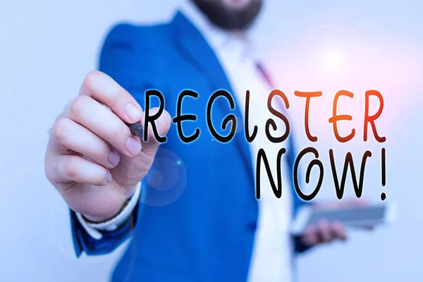 Writing note showing Register Now. Business photo showcasing official list or record showing or things into forum Businessman with pointing finger in front of him. — Stock Photo, Image