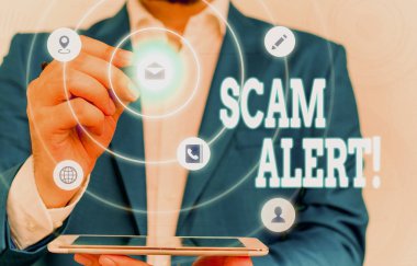 El yazısı yazıları Scam Alert. Konsept, onu ikna ederek kurbandan sahte para almak anlamına gelir..