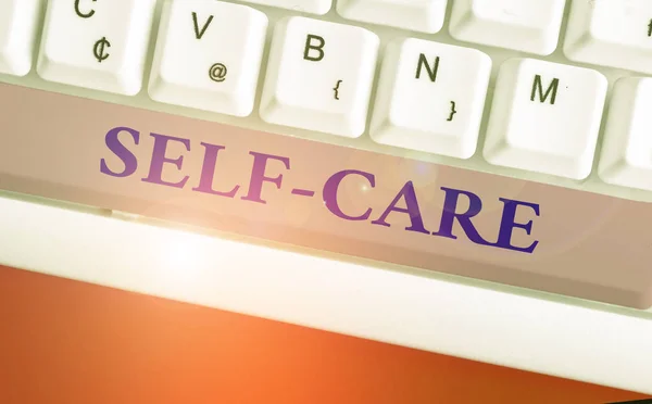 Conceptual hand writing showing Self Care. Business photo text the practice of taking action to improve one s is own health. — Stock Photo, Image
