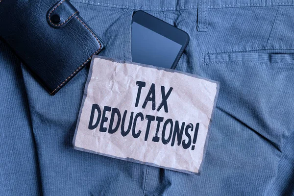 Conceptual hand writing showing Tax Deductions. Business photo showcasing reduction income that is able to be taxed of expenses Smartphone device inside trousers front pocket with wallet. — Stock Photo, Image
