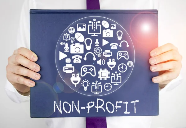 Writing note showing Non Profit. Business photo showcasing not making or conducted primarily to make profit organization.