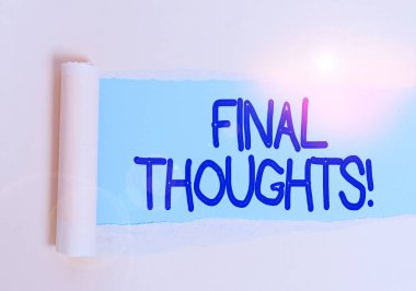 Handwriting text Final Thoughts. Concept meaning should be last few sentences within your conclusions Cardboard which is torn in the middle placed above a plain table backdrop.