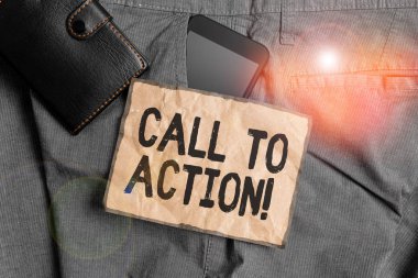 Conceptual hand writing showing Call To Action. Business photo showcasing exhortation do something in order achieve aim with problem Smartphone device inside trousers front pocket with wallet.