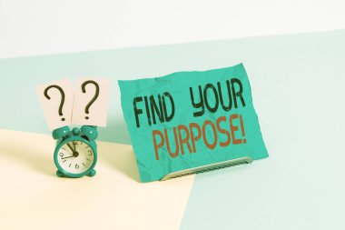 Conceptual hand writing showing Find Your Purpose. Business photo showcasing reason for something is done or for which still exists Alarm clock beside a Paper sheet placed on pastel backdrop.