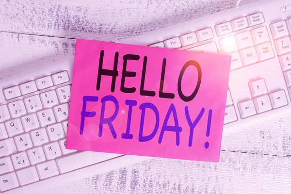 Word writing text Hello Friday. Business concept for used to express happiness from beginning of fresh week White keyboard office supplies empty rectangle shaped paper reminder wood.
