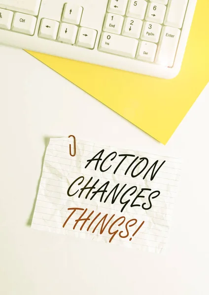 Text sign showing Action Changes Things. Conceptual photo start doing something against problem resolve or achieve it Flat lay above white blank paper with copy space for text messages. — Stock Photo, Image