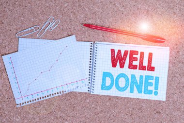 Writing note showing Well Done. Business photo showcasing used praising demonstrating or group for something have done good way Desk notebook paper office paperboard study supplies chart.