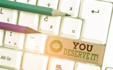 You Deserve It. Business photo vitrine nitelikleri veya eylemleri nedeniyle olmalıdır gösteren not yazma.