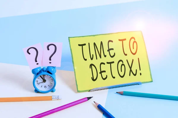 Conceptual hand writing showing Time To Detox. Business photo text when you purify your body of toxins or stop consuming drug Mini size alarm clock beside stationary on pastel backdrop. — 스톡 사진