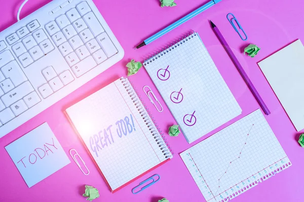 Writing note showing Great Job. Business photo showcasing used praising someone for something they have done well Writing equipments and computer stuffs placed above colored plain table. — ストック写真