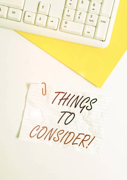 Text sign showing Things To Consider. Conceptual photo think about something carefully in order to make decision Flat lay above white blank paper with copy space for text messages. — Stock Photo, Image