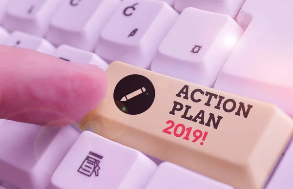 Texto manuscrito Plan de Acción 2019. Concepto que significa estrategia o curso de acción propuesto para el año en curso . —  Fotos de Stock