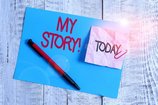 Text sign showing My Story. Conceptual photo your past life events actions or choices you made Wrinkle paper and cardboard plus stationary placed above wooden background. — Stock Photo, Image