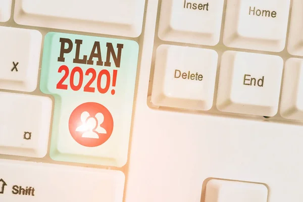 文字书写文本2020年计划详细建议的商业概念明年要实现的目标. — 图库照片