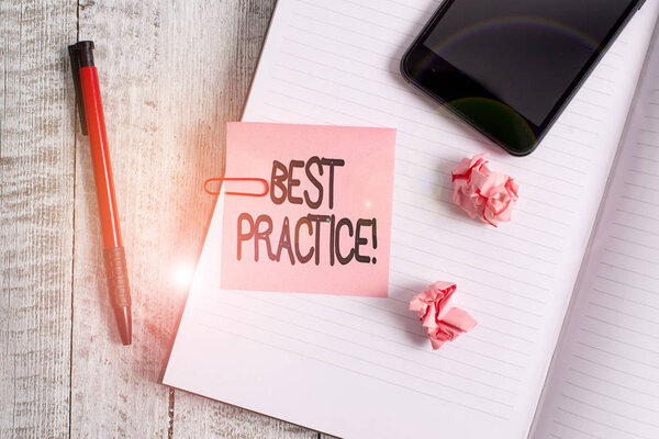 Text sign showing Best Practice. Conceptual photo commercial procedures accepted prescribed being correct Thick pages notebook stationary placed above classic look wooden backdrop.
