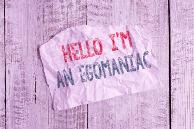 Text sign showing Hello I am An Egoanalysisiac. Conceptual photo Selfish Egocentric Narcissist Selfcentered Ego Crumpled torn paper half broken placed above classic wooden background. clipart