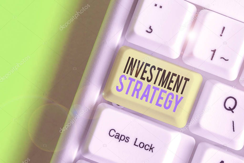 Writing note showing Investment Strategy. Business photo showcasing the systematic plan to allocate investable assets.
