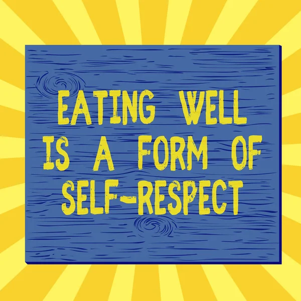 El yazısı iyi yemek yemek bir kendine saygı biçimidir. Kavram, sağlıklı yaşam tarzı kare dikdörtgeninin tanıtımı anlamına geliyor. Gerçek dışı tahta karikatür. Renkli duvara çivilenmiş tahta.. — Stok fotoğraf