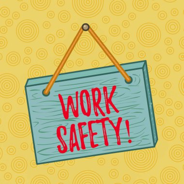 El yazısı, İş Güvenliği. Kavram, çalışanların sağlığını sağlamak için uygulanan politikalar ve prosedürler anlamına geliyor. Meydan, gerçek dışı çizgi film ahşabı renkli duvara asılmış..