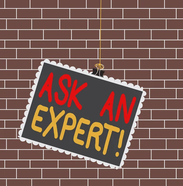 Text sign showing Ask An Expert. Conceptual photo confirmation that have read understand and agree with guidelines Stamp stuck binder clip paper clips square color frame rounded tip sticker. — ストック写真