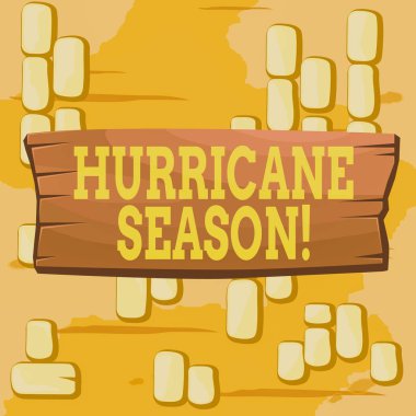 Kelime yazma kasırgası sezonu. Çoğu tropikal kasırganın tahta tahta boş dikdörtgen şeklinde ahşap arka plan geliştirmesinin beklendiği zaman için iş konsepti.