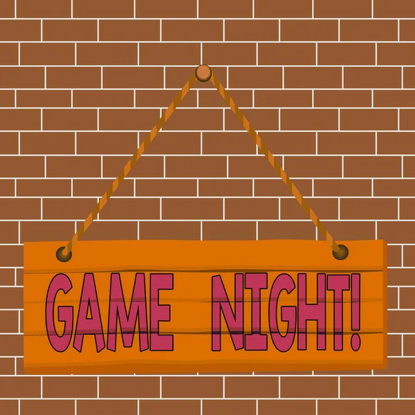 Text sign showing Game Night. Conceptual photo usually its called on adult play dates like poker with friends Wood plank nail pin string board colorful background wooden panel fixed.