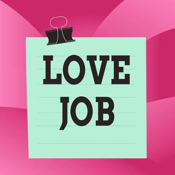 Handwriting text Love Job. Concept meaning designed to help locate a fulfilling job that is right for us Paper lines binder clip cardboard blank square notebook color background.