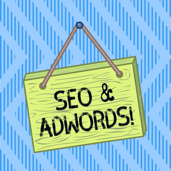 Szóírás Seo és Adwords. Üzleti koncepció ezek fő szerszámok összetevői Search Engine Marketing Square téglalap irreális rajzfilm fa lóg le a színes falon. — Stock Fotó