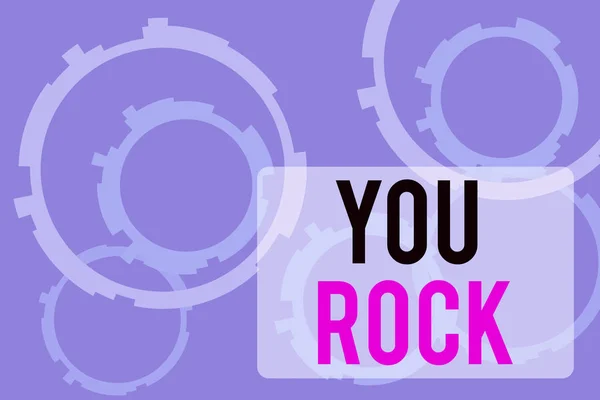 Text sign showing You Rock. Conceptual photo slang phrase of praise or encouragement conveying you are awesome Abstract Texture background with gears plain color behind. Gradient Pattern. — Stock Photo, Image