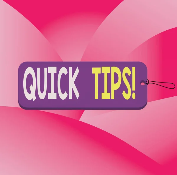 Handwriting text writing Quick Tips. Concept meaning small but particularly useful piece of practical advice Label tag badge rectangle shaped empty space string colorful background.