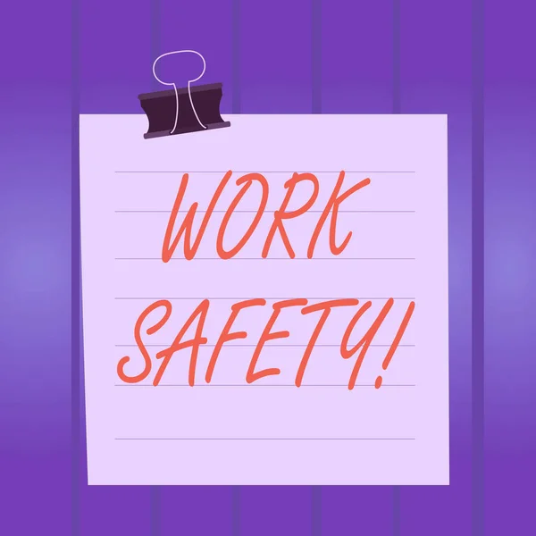 Writing note showing Work Safety. Business photo showcasing policies and procedures in place to ensure health of employees Paper lines binder clip suare notebook color background. — Stock Photo, Image