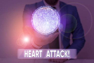 Writing note showing Heart Attack. Business photo showcasing sudden occurrence of coronary thrombosis resulting in death Elements of this image furnished by NASA.
