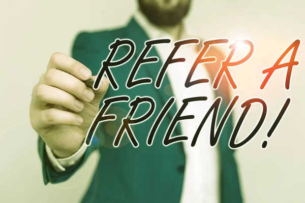 Word writing text Refer A Friend. Business concept for direct someone to another or send him something like gift Businessman with pointing finger in front of him. — Stock Photo, Image