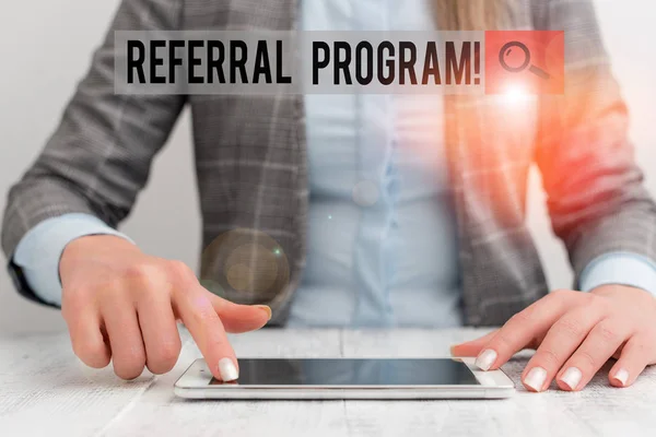 Conceptual hand writing showing Referral Program. Business photo showcasing internal recruitment method employed by organizations Business woman sitting with mobile phone on the table. — Stok fotoğraf