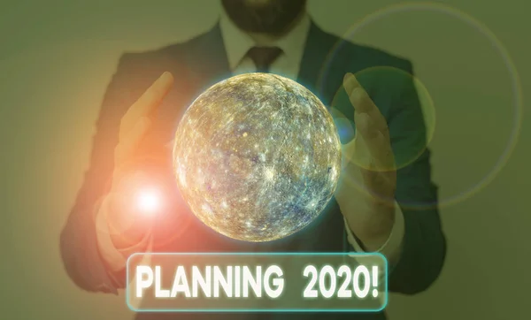 Ecriture conceptuelle montrant Planning 2020 Photo d'affaires montrant le processus de planification de quelque chose l'année prochaine Éléments de cette image fournis par la NASA . — Photo