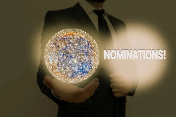 Woord schrijven tekst Nominaties. Zakelijk concept voor actie van nominatie of staat wordt genomineerd voor prijs Elementen van dit beeld geleverd door Nasa. — Stockfoto