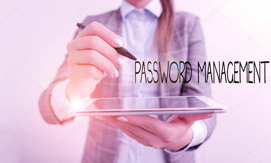 Word writing text Password Management. Business concept for software used to help users better analysisage passwords Business woman pointing in empty space with pen and mobile phone.