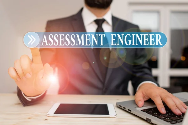 Writing note showing Assessment Engineer. Business photo showcasing gives solutions to the complexities of developing tests Male human wear formal clothes present use hitech smartphone. — Stock Photo, Image