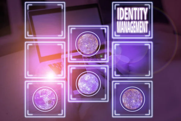 Conceptual hand writing showing Identity Management. Business photo text administration of individual identities within a system Elements of this image furnished by NASA.