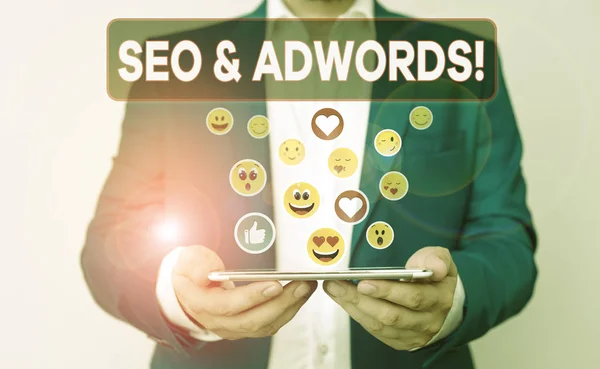 Text sign showing Seo And Adwords. Conceptual photo they are main tools components of Search Engine Marketing. — Stock Photo, Image