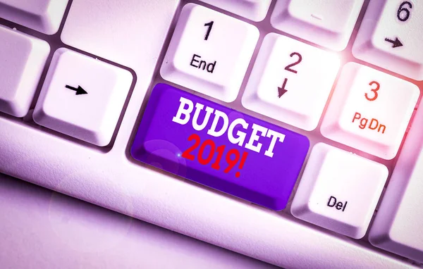 Text sign showing Budget 2019. Conceptual photo estimate of income and expenditure for current year White pc keyboard with empty note paper above white background key copy space. — Stock Photo, Image